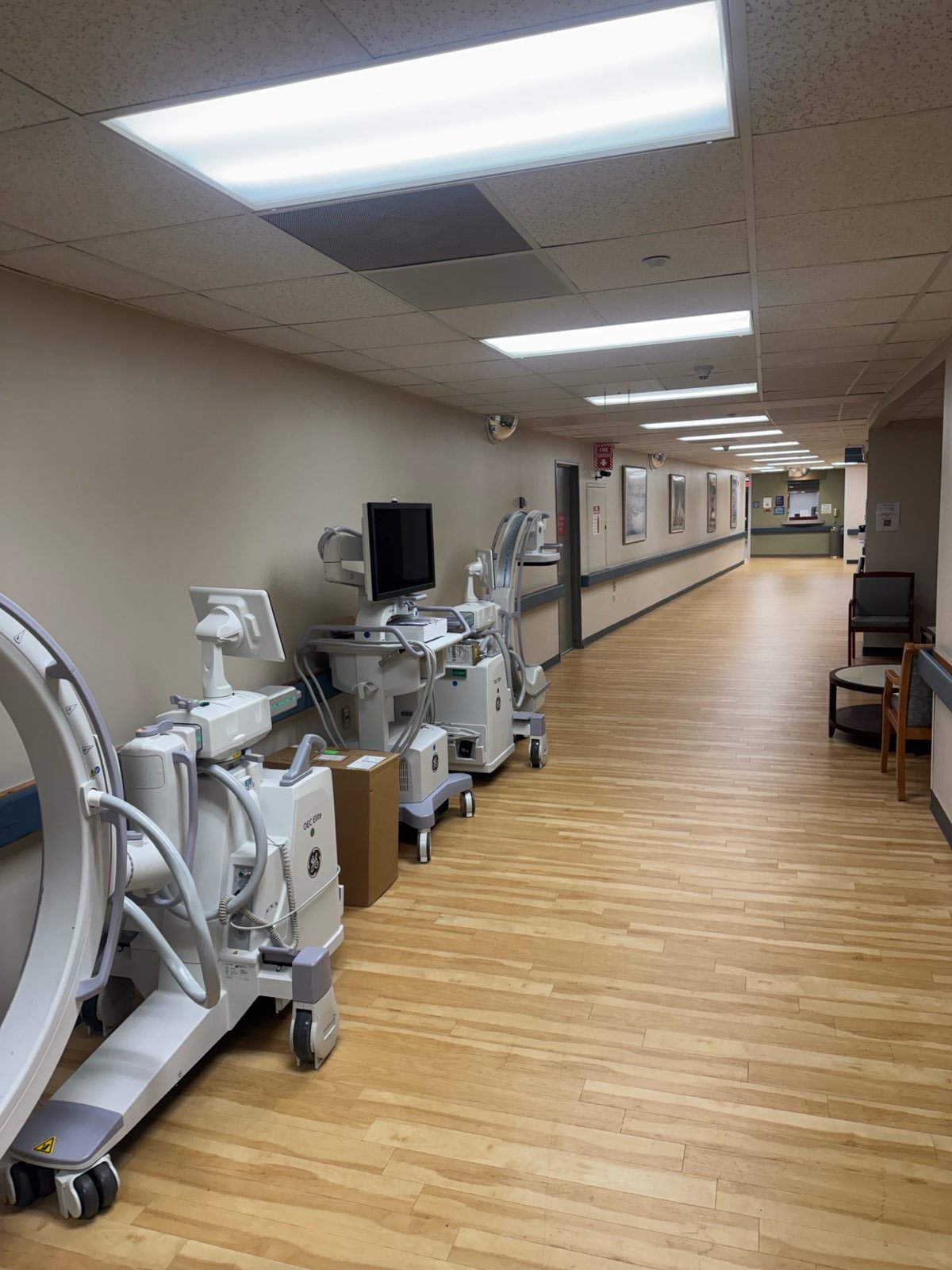 Refurbished surgical equipment staged in a warehouse corridor